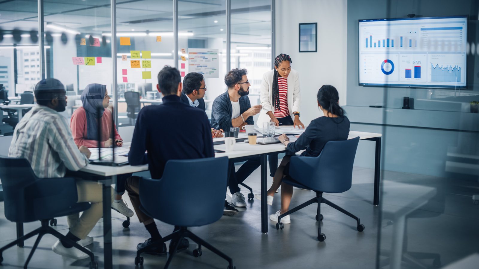 A diverse leadership team in a working strategy session